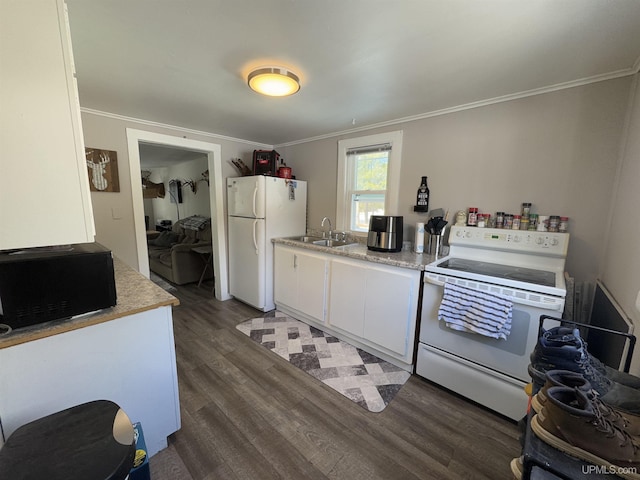 kitchen featuring white appliances, white cabinets, dark wood finished floors, light countertops, and crown molding