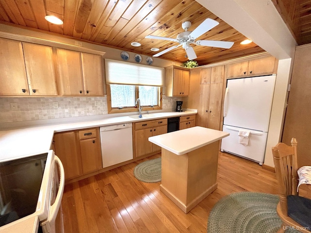 kitchen with light countertops, white appliances, and wooden ceiling