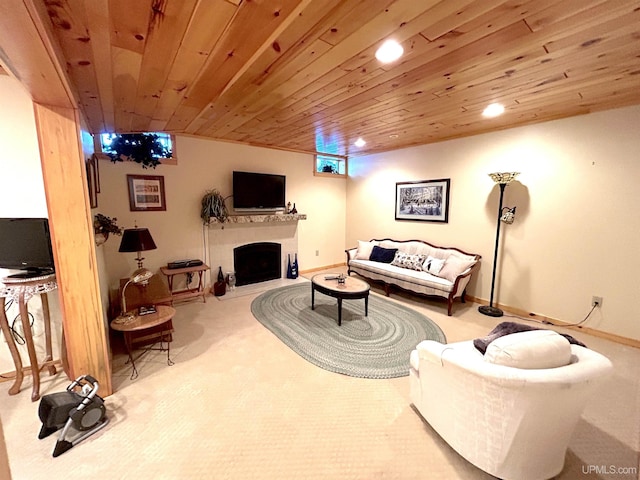 living area featuring carpet, recessed lighting, a fireplace with raised hearth, wood ceiling, and baseboards