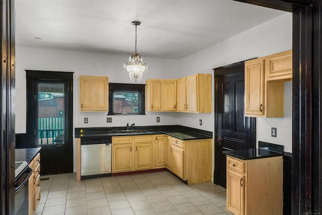 kitchen featuring dishwasher, dark countertops, stove, decorative light fixtures, and a sink