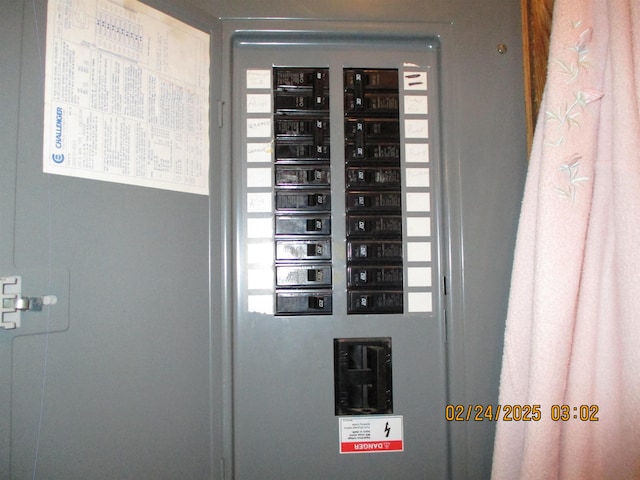 utility room featuring electric panel