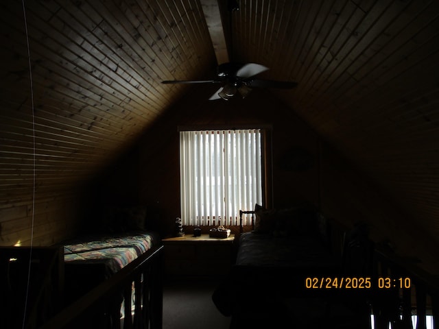 bedroom featuring vaulted ceiling, wood ceiling, and a ceiling fan