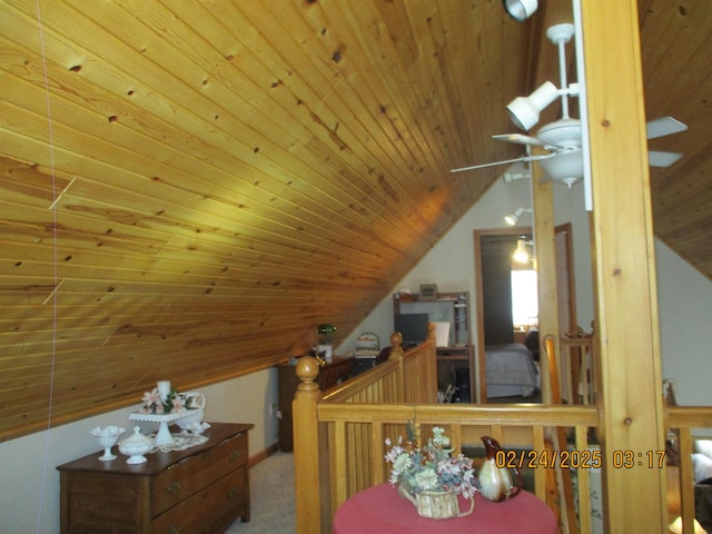 bedroom with lofted ceiling, wooden ceiling, and carpet flooring