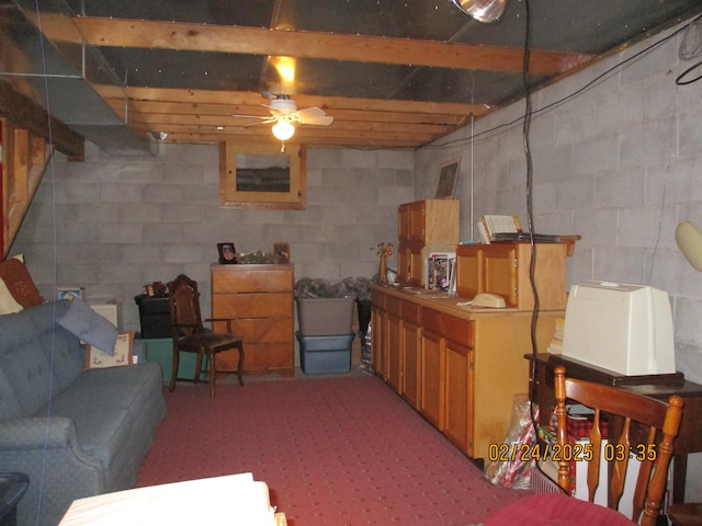 unfinished basement with carpet floors and ceiling fan