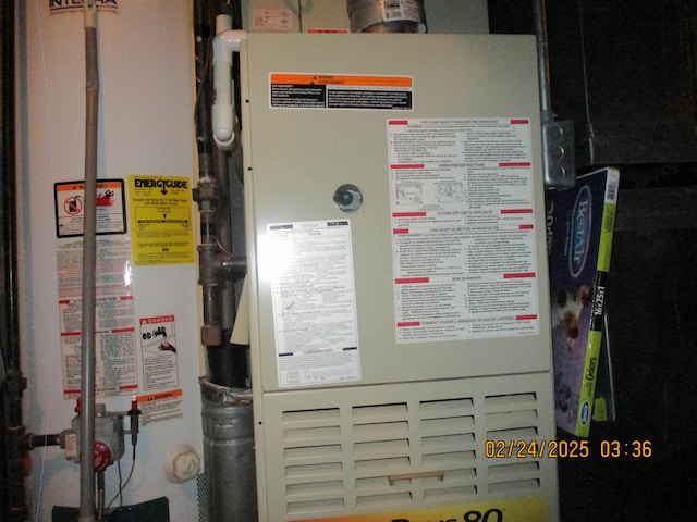 utilities featuring water heater and heating unit