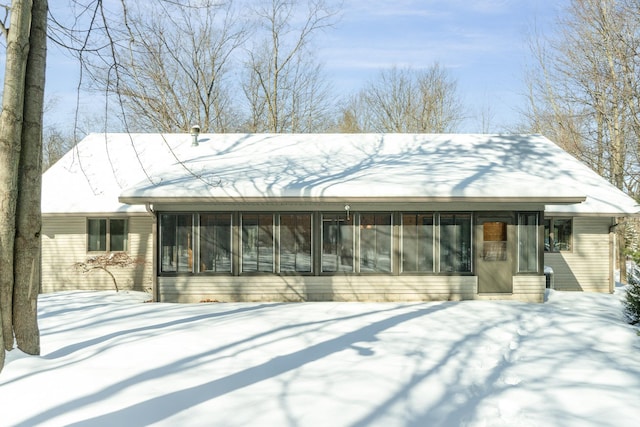 exterior space with a sunroom