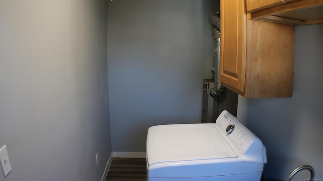 13057 Sherman Ave, Warren, MI 48089 - laundry area with cabinet space, washing machine and dryer, dark wood finished floors, and baseboards