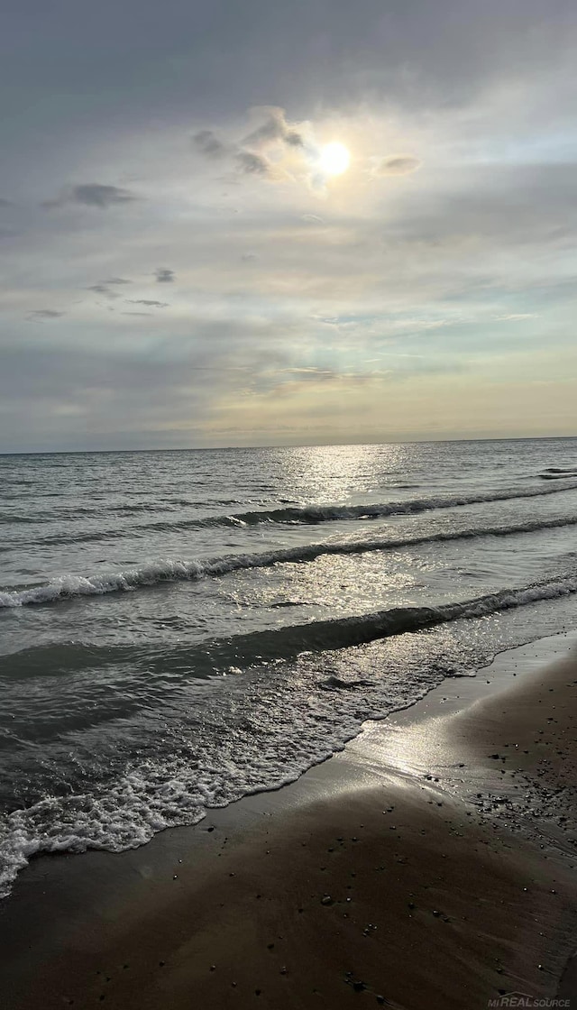 property view of water featuring a view of the beach