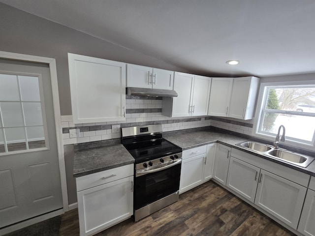 kitchen featuring under cabinet range hood, a sink, white cabinets, stainless steel electric stove, and dark countertops