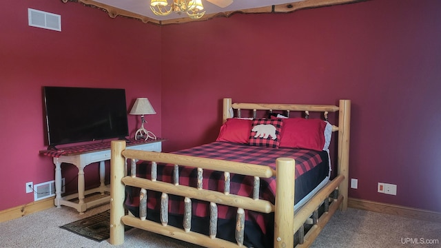 bedroom with carpet flooring, visible vents, and baseboards