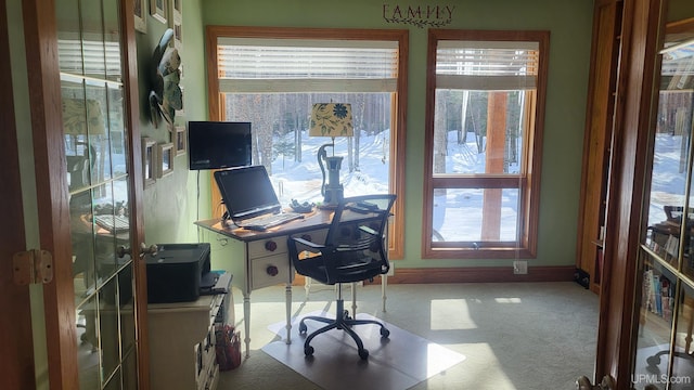 office space with carpet and baseboards