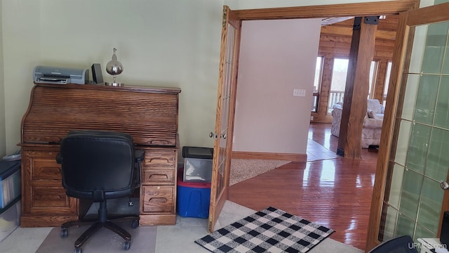 office featuring light wood-style floors and french doors