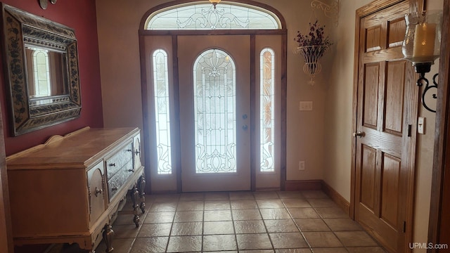 entrance foyer featuring baseboards