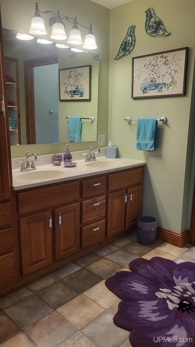 full bath with double vanity and a sink