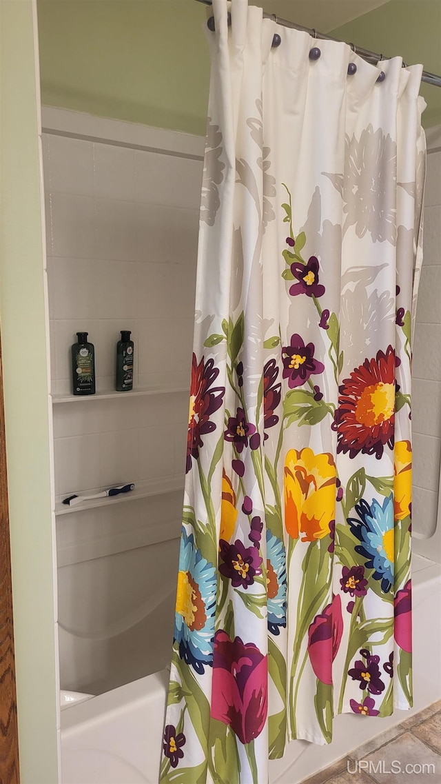 full bathroom featuring shower / bath combo