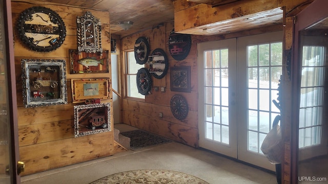 doorway featuring wooden walls