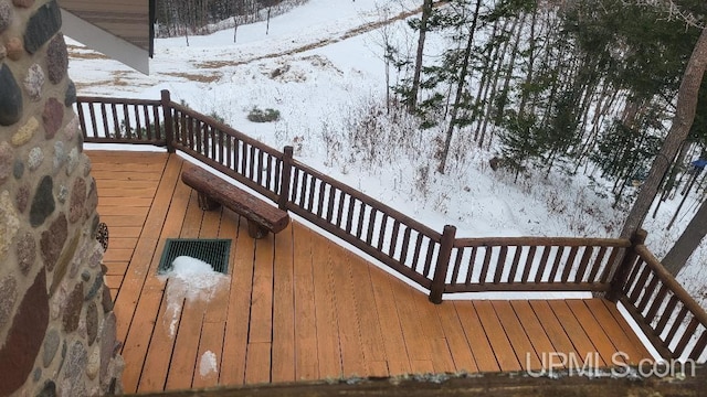 view of snow covered deck