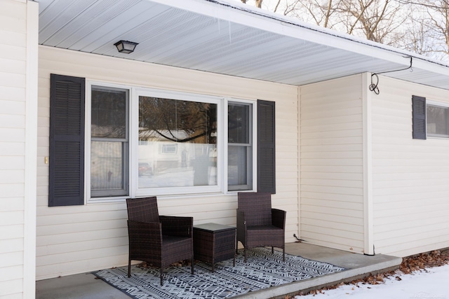 view of snow covered patio