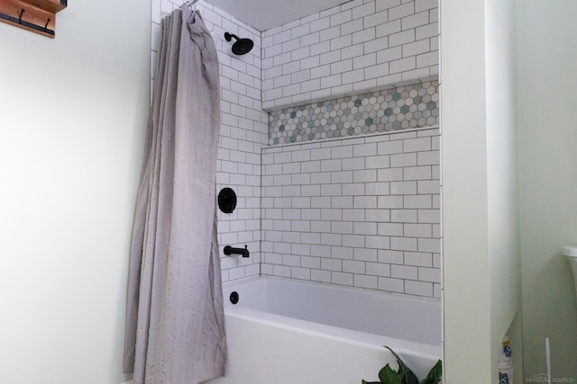 bathroom featuring shower / bath combination with curtain