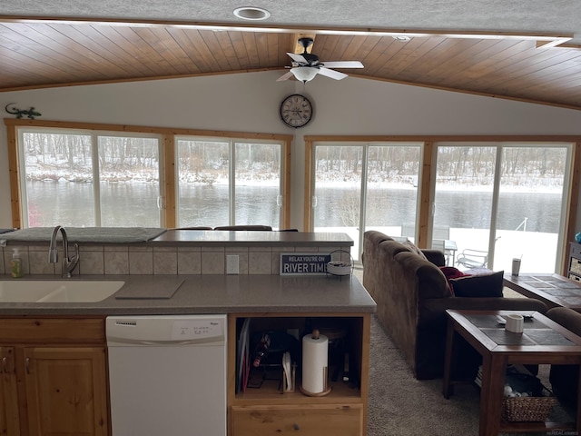 kitchen featuring wooden ceiling, white dishwasher, vaulted ceiling, and a sink