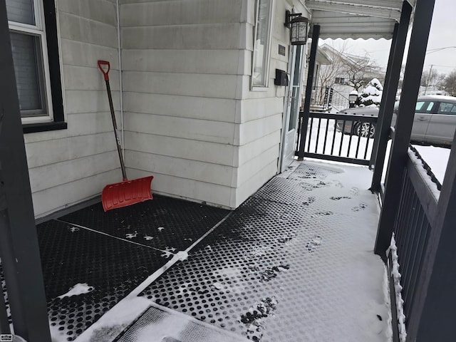 view of snow covered deck