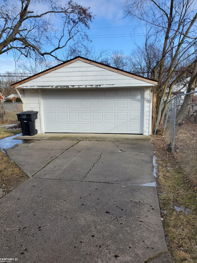 detached garage with fence