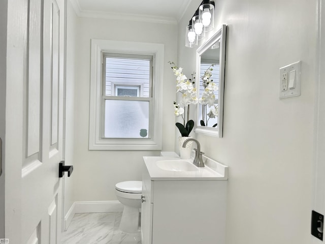 half bathroom featuring baseboards, toilet, marble finish floor, crown molding, and vanity