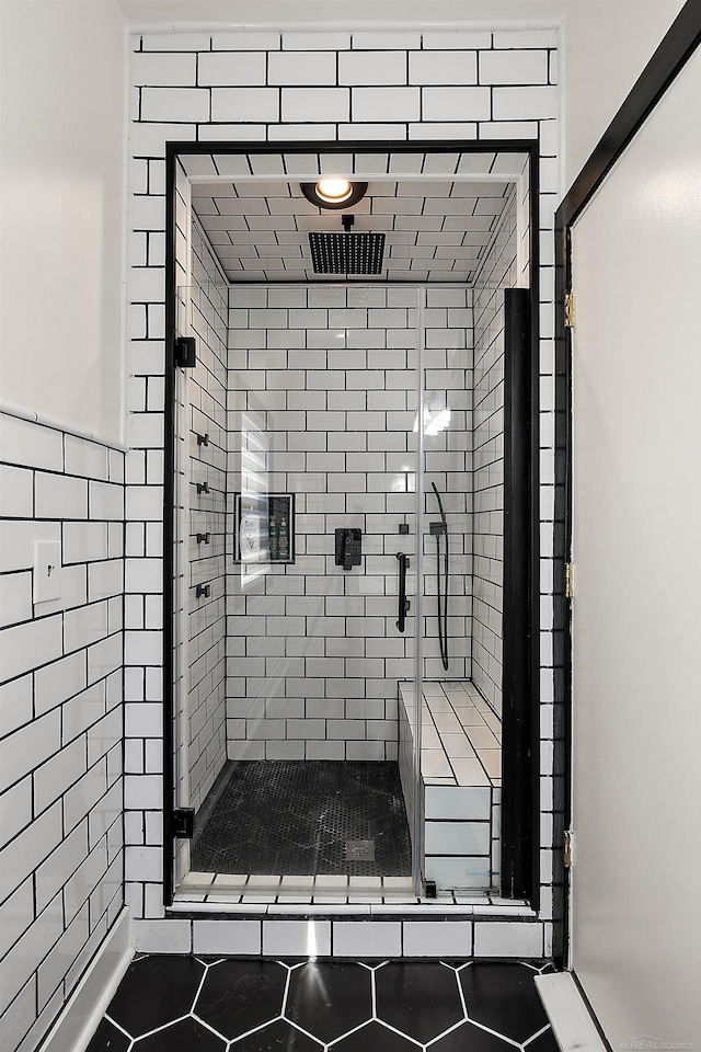 full bath featuring a sauna, a shower stall, and tile patterned floors