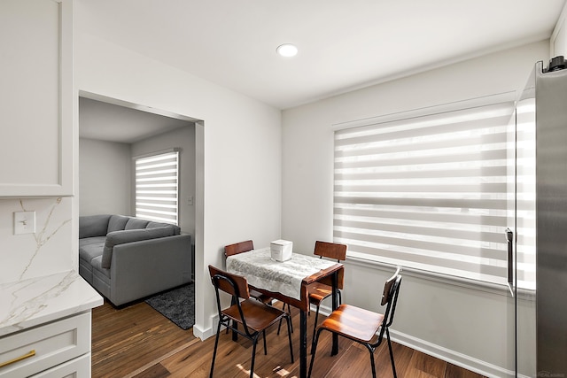 dining space featuring wood finished floors