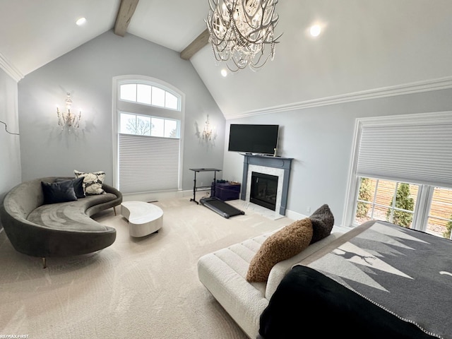 bedroom with carpet, multiple windows, beamed ceiling, and a fireplace with flush hearth