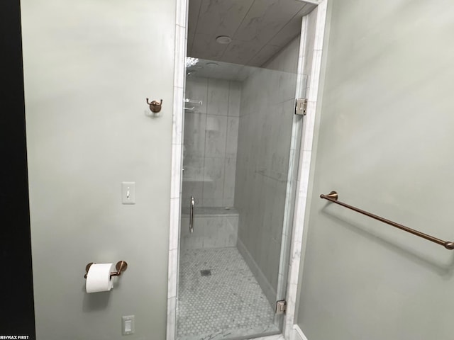 full bath featuring a shower stall