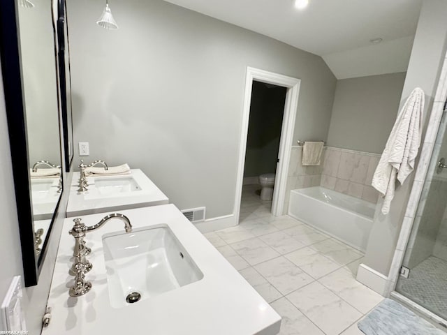 bathroom featuring marble finish floor, visible vents, a sink, and toilet