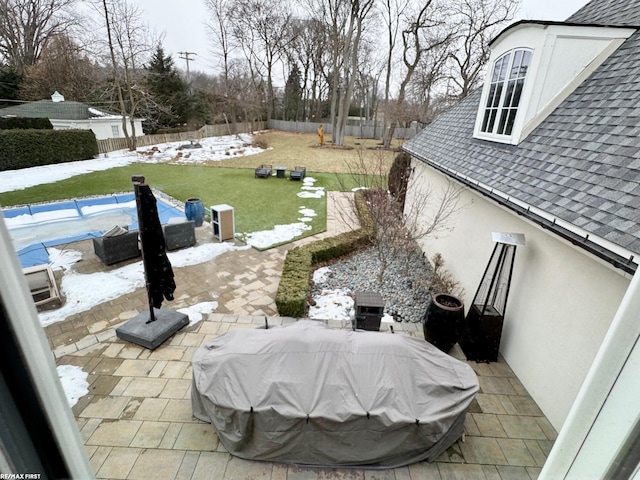 view of patio featuring a fenced backyard and a grill