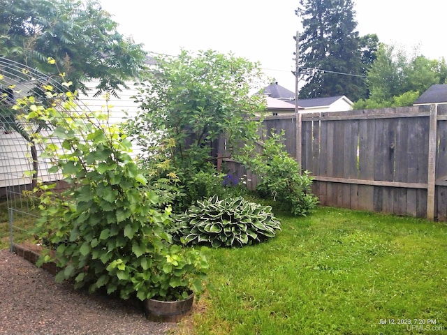 view of yard with fence