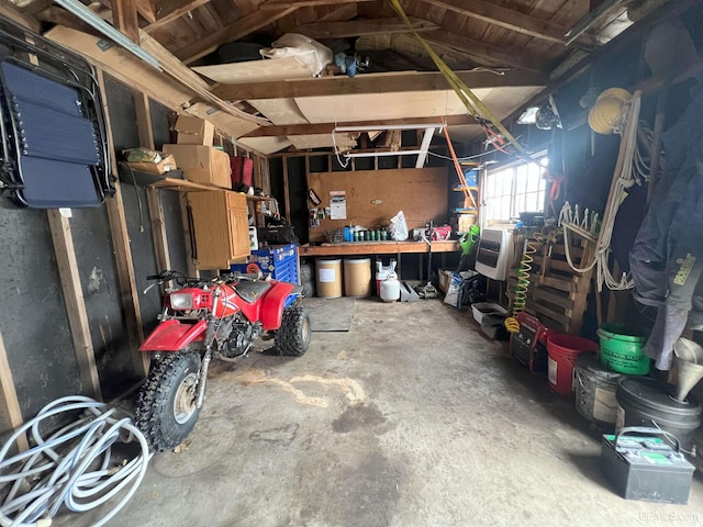 garage featuring a workshop area