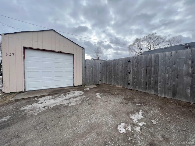 detached garage with fence