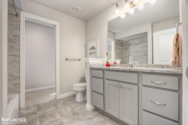 full bathroom featuring visible vents, toilet, vanity, baseboards, and walk in shower