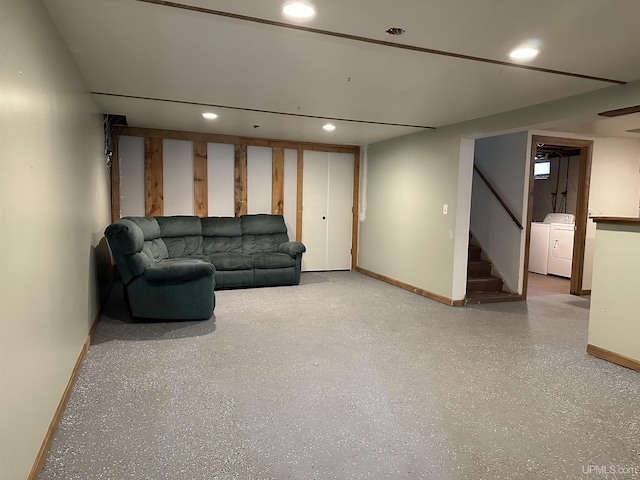 living room featuring speckled floor, recessed lighting, washing machine and dryer, baseboards, and stairs