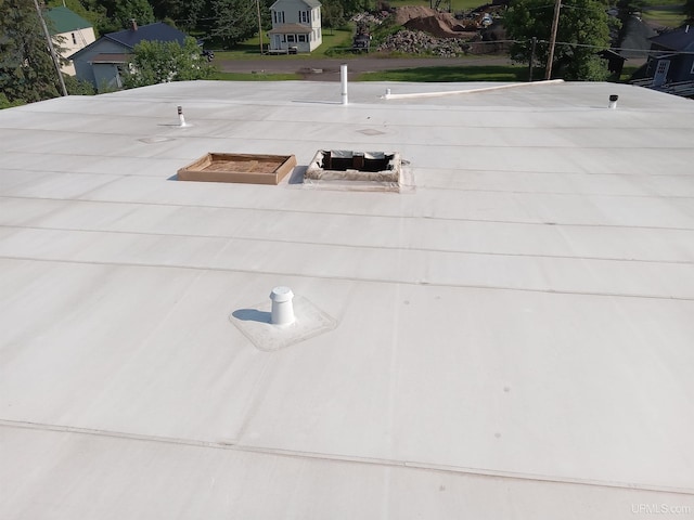 exterior details with a flat roof