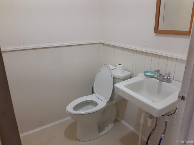 bathroom with a sink and toilet