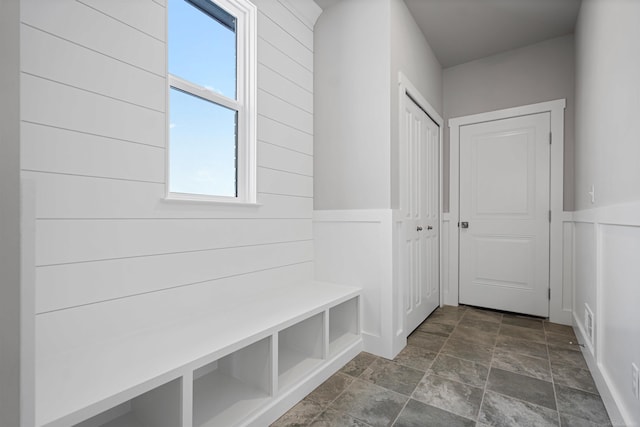 mudroom featuring a wainscoted wall