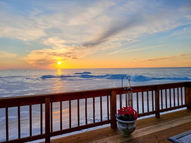 deck at dusk with a water view