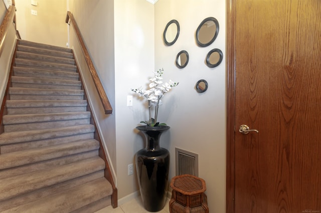 staircase with baseboards