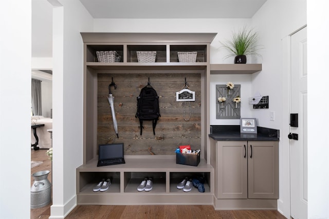 mudroom with wood finished floors