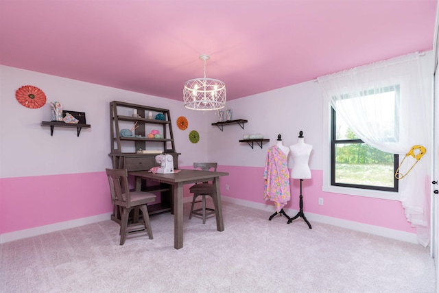 dining room with an inviting chandelier, baseboards, and light colored carpet