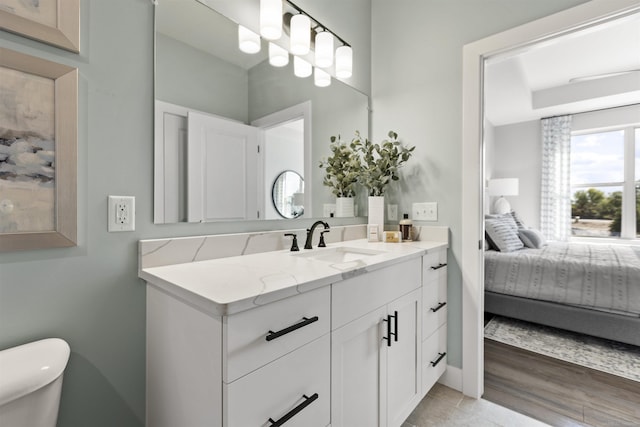 3888 Chatham Pl Unit 99, Brighton, MI 48114 - bathroom with toilet, ensuite bathroom, and vanity