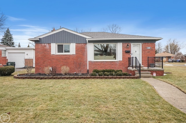 view of front facade featuring a garage, brick siding, and a front lawn