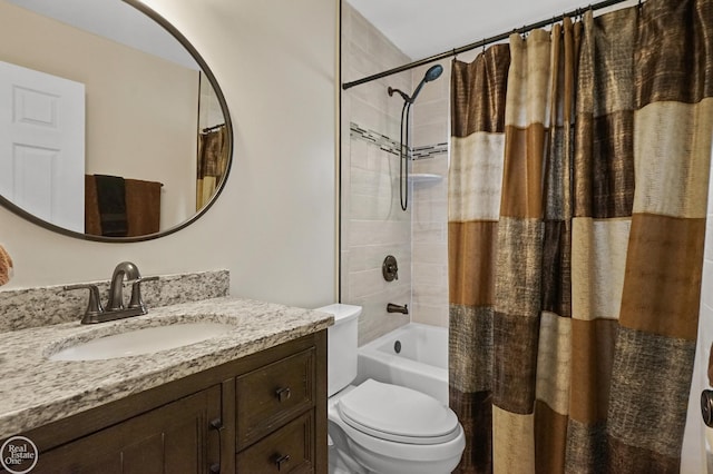 bathroom featuring toilet, shower / tub combo with curtain, and vanity