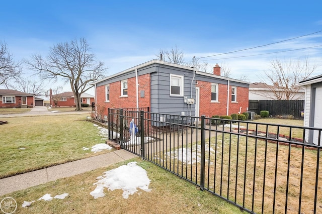 view of home's exterior with brick siding, a lawn, a chimney, and cooling unit