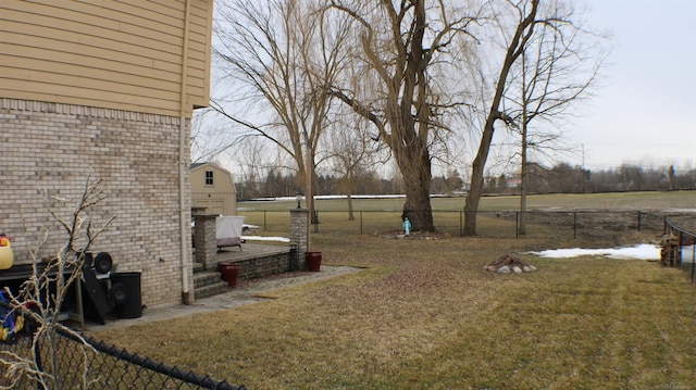 view of yard with fence